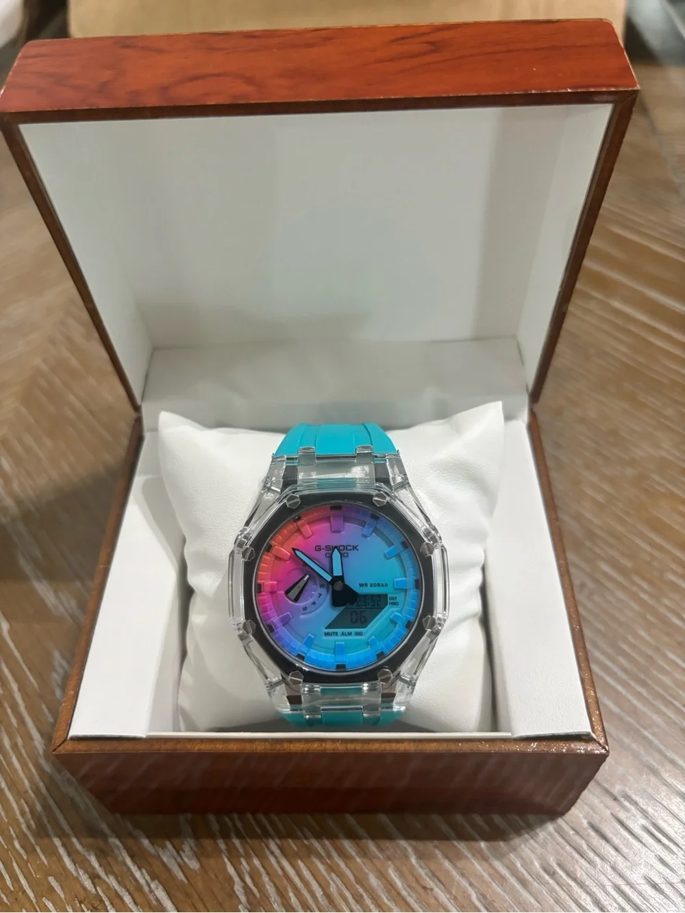 G-Shock Turquoise Strap Clear Case Rainbow Gradient Dial